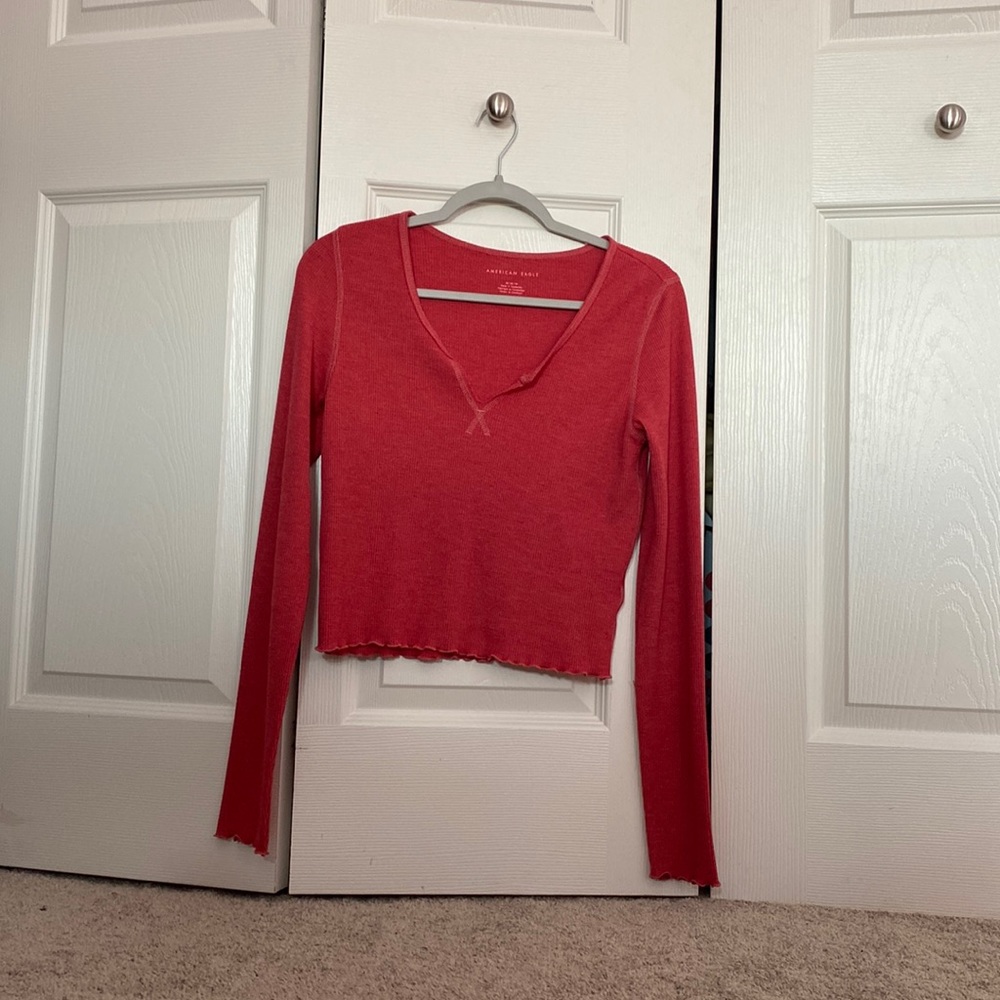 this is a red long sleeve top from american eagle and it might run a bit big